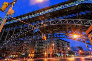 Elevated train tracks at the 125th Street Subway Station and Broadway in New York City. photo