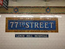 New York City - August 29, 2019 -  77th Street Subway station sign in New York City. photo