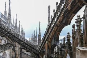 Milan Cathedral, Duomo di Milano, one of the largest churches in the world, on Piazza Duomo square in the Milan city center in Italy. photo