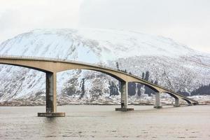 Gimsoystraumen Bridge is a cantilever road bridge that crosses the Gimsoystraumen strait between the islands of Austvagoya and Gimsoya in the municipality of Vagan in Nordland county, Norway. photo