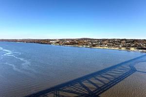 View from the Mid-Hudson Bridge crossing the Hudson River in Poughkeepsie, New York photo