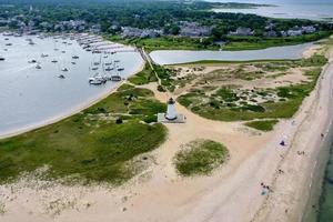 Edgartown Harbor Lighthouse at the entrance into Edgartown Harbor and Katama Bay, Martha's Vineyard, Massachusetts, USA. The historic lighthouse was built in 1828. photo