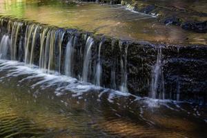 Treppoja waterfall in summer photo