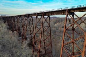 Moodna Viaduct Trestle. The Moodna Viaduct is an iron railroad trestle spanning Moodna Creek and its valley at the north end of Schunemunk Mountain in Cornwall, New York. photo