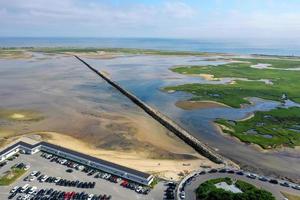 Provincetown Causeway also known as the Breakwater Walk, is an uneven collection of rocks that allows hikers to cross the harbor and reach the very tip of the Cape. photo