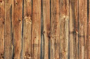 Background of flat, weathered wooden lumber wall. photo