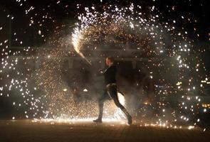 Festive fire show performed by professionals photo