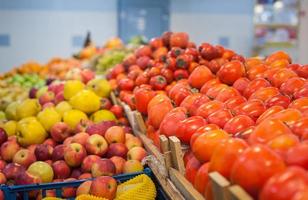 Fruit market with various colorful fresh fruits and vegetables photo