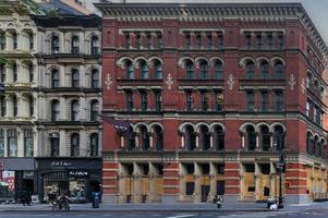 New York City, New York - June 11, 2020 -  Store closed during the COVID-19 pandemic, with boarded up windows to protect against looting as a result of anti-police brutality protests. photo