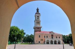 Town Hall of Kamenets Podolsky in Ukraine. Kamenetz-Podolsk City Hall was built on the central square of the Old Town in the 14th century and is considered one of the oldest in Ukraine. photo