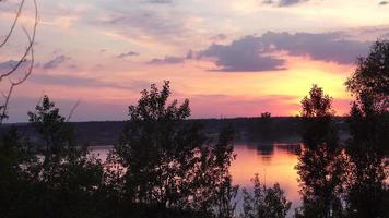 a beautiful sunset on the river timelapse video