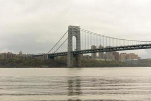 George Washington Bridge crossing the Hudson River on a overcast cloudy day from Fort Lee, New Jersey. photo