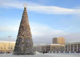 Yakutsk, Russian Federation, 2019 - New year tree in Yakutsk city. Christmas tree with snow. photo