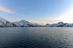 Winter landscape along the village of Fredvang in the Lofoten Islands, Norway. photo