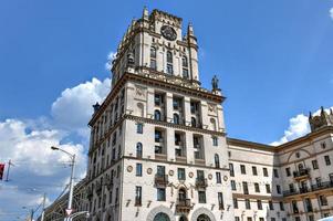 Gates of Minsk, two symmetrical high towers in the style of Stalin classicism. This style combines the elements of baroque, late classicism and art deco, 2022 photo