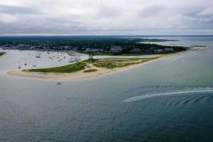 Edgartown Harbor Lighthouse at the entrance into Edgartown Harbor and Katama Bay, Martha's Vineyard, Massachusetts, USA. The historic lighthouse was built in 1828. photo