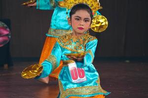 Jakarta, Indonesia in November 2022. Young children ranging from kindergarten to elementary school are taking part in the National Archipelago dance competition. photo