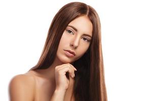 Brunette with straight hair on white background photo