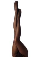 Female legs in black pantyhose photo