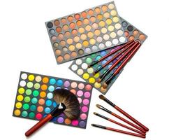 Professional makeup brushes and eyeshadow palette photo