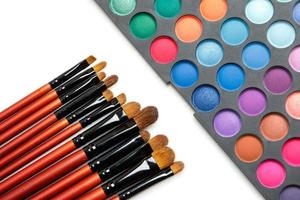 Professional makeup brushes and eyeshadow palette photo