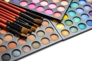 Professional makeup brushes and eyeshadow palette photo