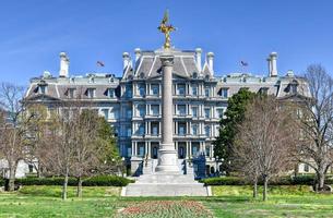 The Eisenhower Executive Office Building in Washington, DC. In front is the First Division Monument, tribute to those who died while serving in the 1st Infantry Division of the US Army. photo