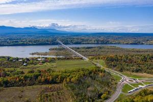 Aerial view of the Rip Van Winkle Bridge spanning the Hudson River between Catskill, NY and Hudson NY photo