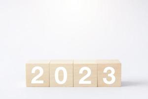 2023 business growing growth concept to success. woods block step with icon concept about business strategy, Action plan, Goal and target, hand stack, project, vision. photo