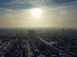 High angle view of Snow covered North Luton's landscape and Cityscape, Aerial Footage of Northern Luton City of England UK after Snow Fall. The 1st Snow Fall of this Winter of 2022 photo