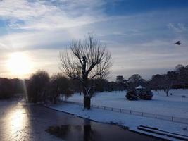 Gorgeous View of Local Public Park After Snow Fall over England photo