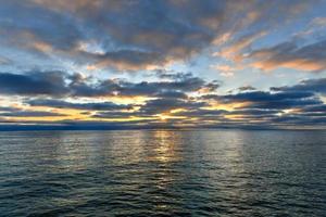 Sunset by the Ocean Beach Pier in San Diego, California. photo