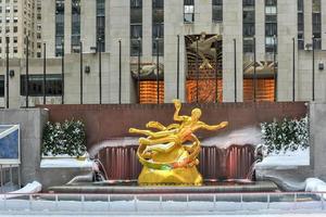 New York - January 24, 2016 -  Prometheus statue and ice rink in Rockefeller Center in New York. photo