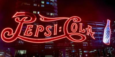 New York City - January 2, 2016 -  PepsiCola sign and Queensboro Bridge at night as seen from Gantry Plaza, Long Island. photo
