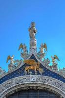 Saint Mark's Square in Venice Italy. It is the principal public square of Venice, Italy, where it is generally known just as la Piazza. photo