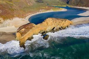 Ocean fog rolling in onto Highway 1 and Big Sur, California, USA photo