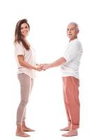 Woman and her eldelry father on white background photo