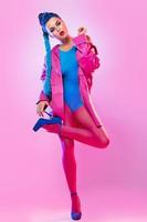 Stylish woman in pink and blue clothes photo