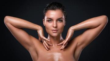 Beautiful woman with oily and wet skin photo