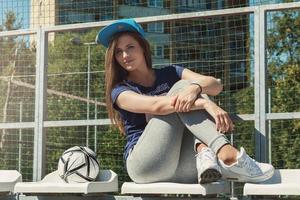 Beautiful teenage girl on the school yard photo