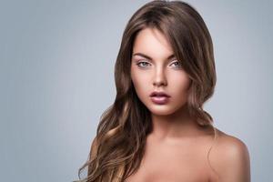 Portrait of young woman with curly hair photo