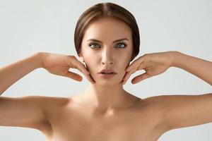 Woman with perfect face in natural light photo