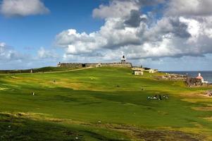 Castillo San Felipe del Morro also known as Fort San Felipe del Morro or Morro Castle at dusk. It is a 16th-century citadel located in San Juan, Puerto Rico. photo