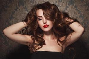 Portrait of beautiful woman with red lips photo