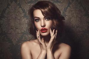 Portrait of beautiful woman with red lips photo