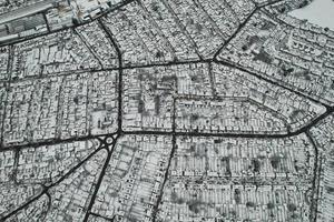 High angle view of Snow covered North Luton's landscape and Cityscape, Aerial Footage of Northern Luton City of England UK after Snow Fall. The 1st Snow Fall of this Winter of 2022 photo