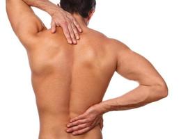 Man with pain in his back photo