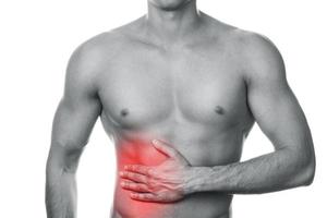 Man with pain in his stomach photo