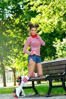 Woman on the roller-skate in the park photo