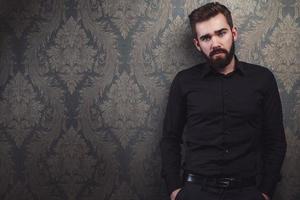 Portrait of stylish handsome man with a beard photo